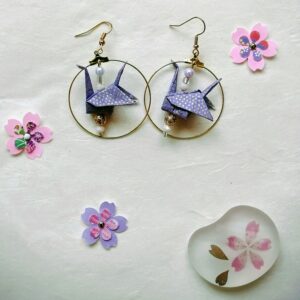Tsuru Earrings purple-toned with pearls in ring shape